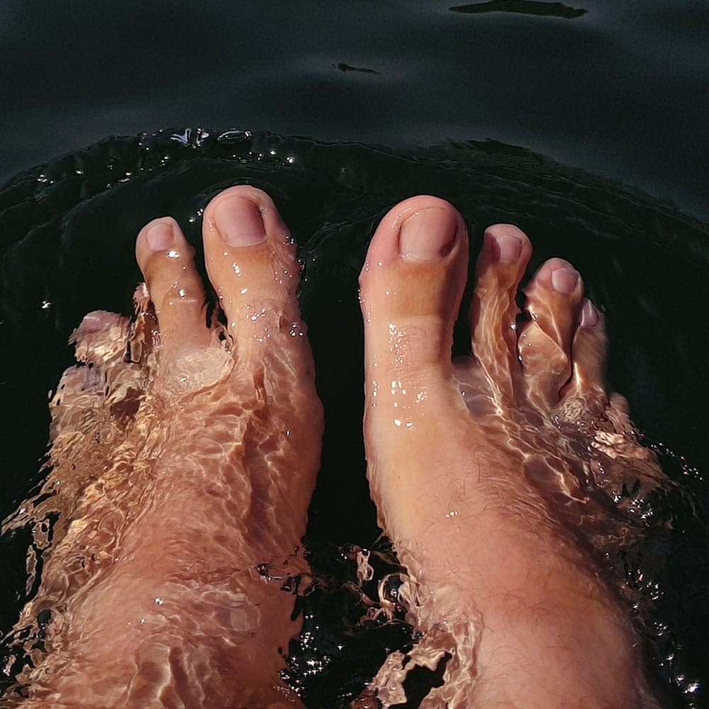 feet floating in water