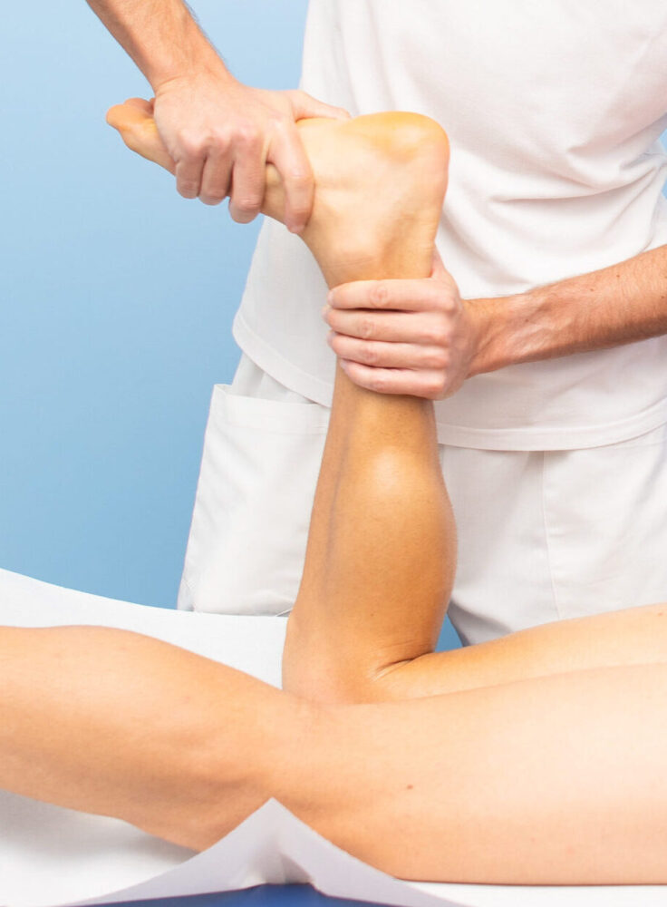 Stretching foot and leg to treat Achilles tendinitis