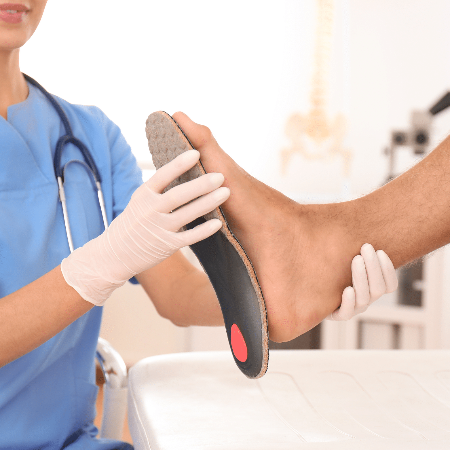 doctor checking foot and ankle